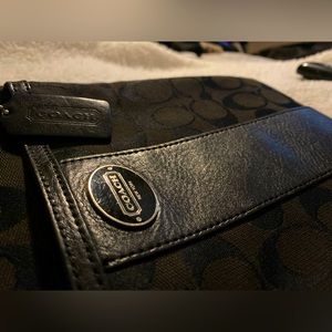 All black coach bag. Work a total of three times.